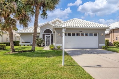 Gorgeous lakefront 3 bedroom home with multiple updates and on Capri Isle Golf Club in Florida - for sale on GolfHomes.com, golf home, golf lot