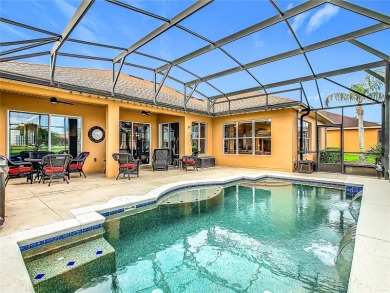 ABSOLUTELY STUNNING Operetta model with a SALT WATER POOL on a on Poinciana Golf Club in Florida - for sale on GolfHomes.com, golf home, golf lot