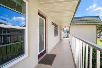 Enhance your lifestyle in Vista Gardens, a highly sought-after on Vero Beach South Golf Course in Florida - for sale on GolfHomes.com, golf home, golf lot