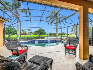 ABSOLUTELY STUNNING Operetta model with a SALT WATER POOL on a on Poinciana Golf Club in Florida - for sale on GolfHomes.com, golf home, golf lot