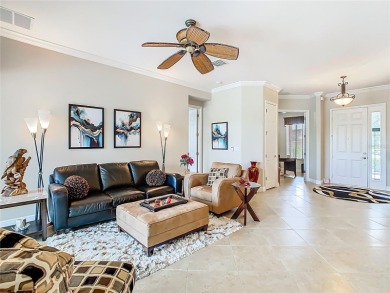 ABSOLUTELY STUNNING Operetta model with a SALT WATER POOL on a on Poinciana Golf Club in Florida - for sale on GolfHomes.com, golf home, golf lot