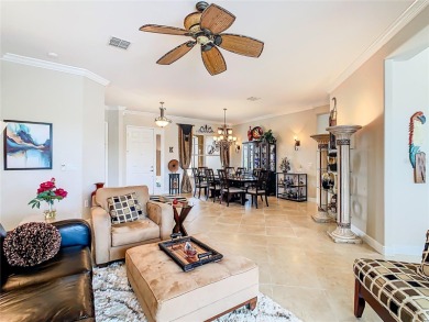 ABSOLUTELY STUNNING Operetta model with a SALT WATER POOL on a on Poinciana Golf Club in Florida - for sale on GolfHomes.com, golf home, golf lot