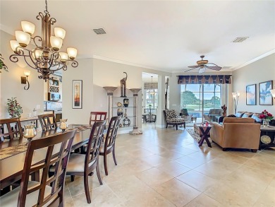 ABSOLUTELY STUNNING Operetta model with a SALT WATER POOL on a on Poinciana Golf Club in Florida - for sale on GolfHomes.com, golf home, golf lot