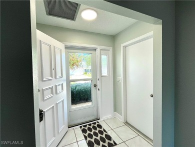 CLEAN, CRISP and FRESHLY PAINTED CORNER UNIT! This condo is on Myerlee Country Club in Florida - for sale on GolfHomes.com, golf home, golf lot