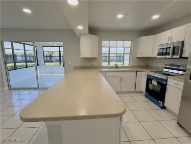 CLEAN, CRISP and FRESHLY PAINTED CORNER UNIT! This condo is on Myerlee Country Club in Florida - for sale on GolfHomes.com, golf home, golf lot