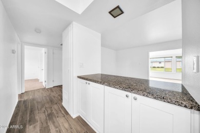 Thoughtfully designed, spacious floorplan just steps away from on Sun City South Golf Course in Arizona - for sale on GolfHomes.com, golf home, golf lot