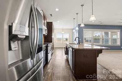 3% Assumable FHA Rate! Welcome to life ON the golf course in the on Fox Den Country Club in North Carolina - for sale on GolfHomes.com, golf home, golf lot