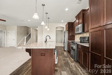 3% Assumable FHA Rate! Welcome to life ON the golf course in the on Fox Den Country Club in North Carolina - for sale on GolfHomes.com, golf home, golf lot