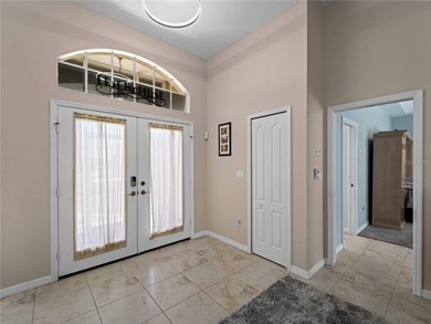 Welcome to this beautifully maintained custom home located in on Deep Creek Golf Club in Florida - for sale on GolfHomes.com, golf home, golf lot