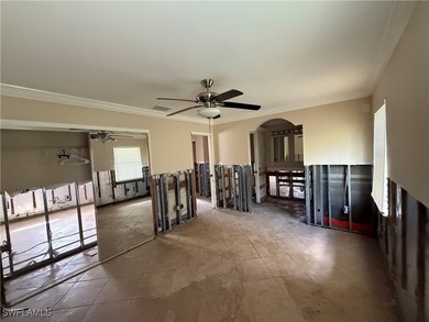 This investor special offers a unique opportunity for those on Twin Isles Country Club in Florida - for sale on GolfHomes.com, golf home, golf lot