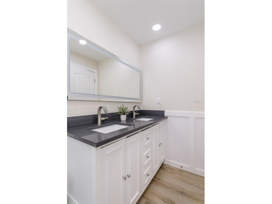 Looking for a move-in ready, completely updated 2Br/2Ba/2Gar on Lansbrook Golf Club in Florida - for sale on GolfHomes.com, golf home, golf lot