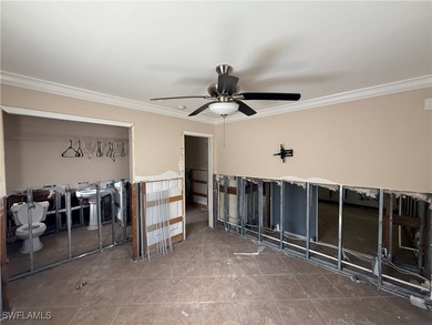 This investor special offers a unique opportunity for those on Twin Isles Country Club in Florida - for sale on GolfHomes.com, golf home, golf lot