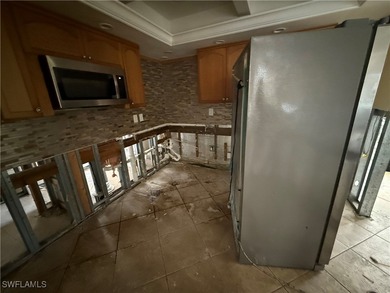 This investor special offers a unique opportunity for those on Twin Isles Country Club in Florida - for sale on GolfHomes.com, golf home, golf lot