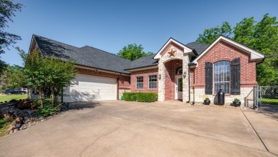 PRISTINE PECAN PLANTATION HOME offers curb appeal, charm, and on Nutcracker Golf Club in Texas - for sale on GolfHomes.com, golf home, golf lot