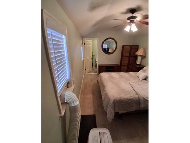 LARGE RV LOT WITH OVERSIZED PORT, BEDROOM, BATH, PATIO AREA AND on Deer Creek RV Golf Resort in Florida - for sale on GolfHomes.com, golf home, golf lot