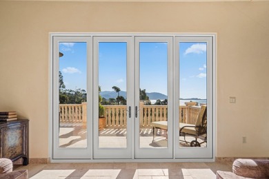 Perched on a gated one-acre parcel near The Lodge at Pebble on Poppy Hills Golf Course in California - for sale on GolfHomes.com, golf home, golf lot