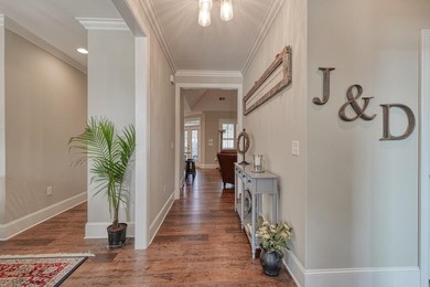 Beautifully designed 4 bedroom/3.5 bathroom home tucked away on on Woodfin Ridge Golf Club in South Carolina - for sale on GolfHomes.com, golf home, golf lot