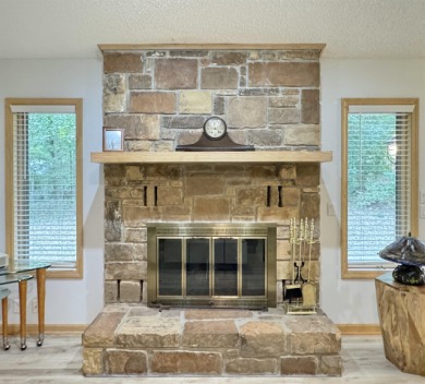 Discover the epitome of move-in-ready luxury at 26 Emmanuel on DeSoto Golf Course in Arkansas - for sale on GolfHomes.com, golf home, golf lot
