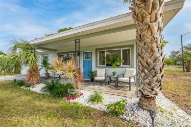 You don't want to miss this stunning, updated corner lot home in on Mangrove Bay Golf Course in Florida - for sale on GolfHomes.com, golf home, golf lot