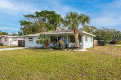 You don't want to miss this stunning, updated corner lot home in on Mangrove Bay Golf Course in Florida - for sale on GolfHomes.com, golf home, golf lot
