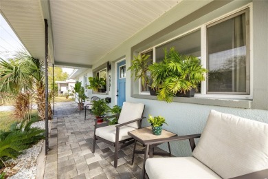 You don't want to miss this stunning, updated corner lot home in on Mangrove Bay Golf Course in Florida - for sale on GolfHomes.com, golf home, golf lot