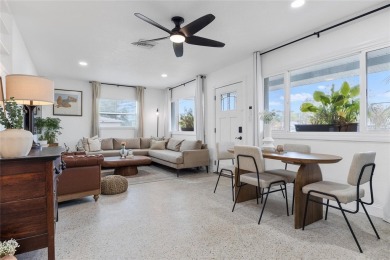 You don't want to miss this stunning, updated corner lot home in on Mangrove Bay Golf Course in Florida - for sale on GolfHomes.com, golf home, golf lot
