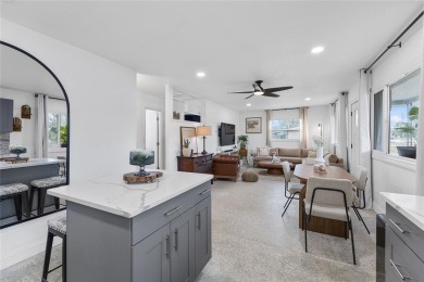 You don't want to miss this stunning, updated corner lot home in on Mangrove Bay Golf Course in Florida - for sale on GolfHomes.com, golf home, golf lot