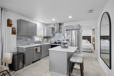 You don't want to miss this stunning, updated corner lot home in on Mangrove Bay Golf Course in Florida - for sale on GolfHomes.com, golf home, golf lot