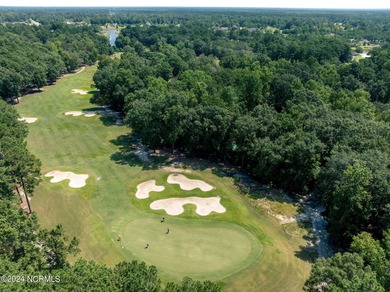 Located on one of the most beautiful holes in River Landing, the on River Landing Golf Course in North Carolina - for sale on GolfHomes.com, golf home, golf lot