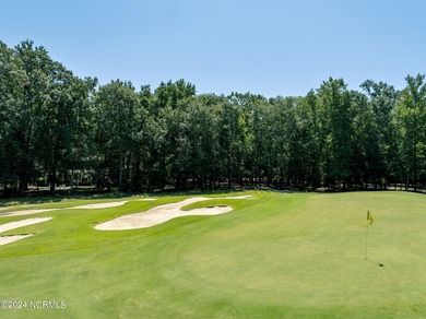 Located on one of the most beautiful holes in River Landing, the on River Landing Golf Course in North Carolina - for sale on GolfHomes.com, golf home, golf lot