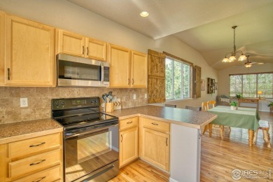 Tucked away in a quiet cul-de-sac, this spacious 3-bedroom on Pelican Lakes Golf and Country Club in Colorado - for sale on GolfHomes.com, golf home, golf lot