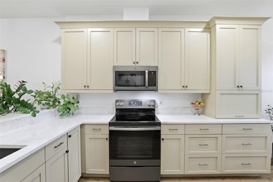 Enjoy maintenance-free living in this beautifully updated on Remington Golf Club in Florida - for sale on GolfHomes.com, golf home, golf lot