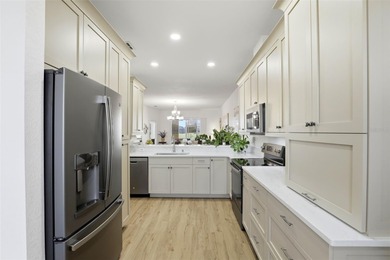 Enjoy maintenance-free living in this beautifully updated on Remington Golf Club in Florida - for sale on GolfHomes.com, golf home, golf lot