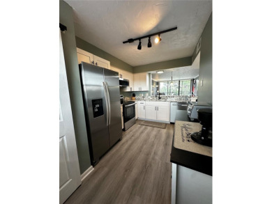 Discover the best of resort-style living in this well-kept on Cove Cay Country Club in Florida - for sale on GolfHomes.com, golf home, golf lot