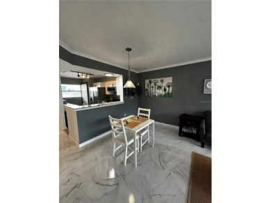 Discover the best of resort-style living in this well-kept on Cove Cay Country Club in Florida - for sale on GolfHomes.com, golf home, golf lot