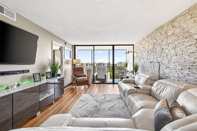 Stylish Top Floor Condo in Clearwater's Cove Cay Community on Cove Cay Country Club in Florida - for sale on GolfHomes.com, golf home, golf lot