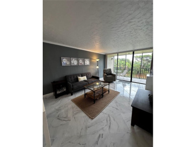 Discover the best of resort-style living in this well-kept on Cove Cay Country Club in Florida - for sale on GolfHomes.com, golf home, golf lot