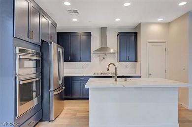 Beautiful two-story Henderson home for sale in the sought-after on Reflection Bay Golf Club in Nevada - for sale on GolfHomes.com, golf home, golf lot