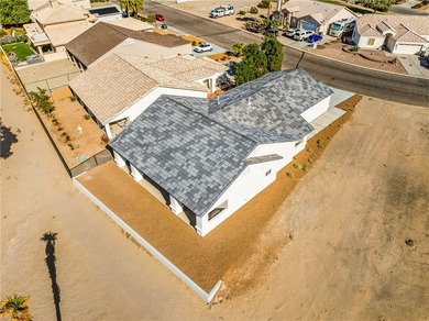Welcome to this stunning modern 3 bedroom/2 bathroom home built on Desert Lakes Golf Course in Arizona - for sale on GolfHomes.com, golf home, golf lot