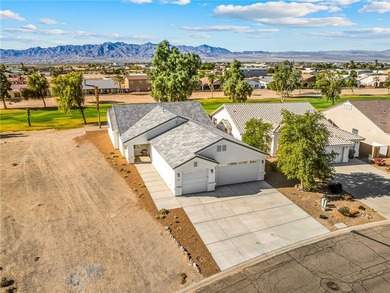 Welcome to this stunning modern 3 bedroom/2 bathroom home built on Desert Lakes Golf Course in Arizona - for sale on GolfHomes.com, golf home, golf lot