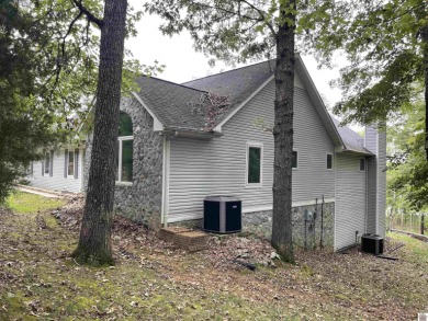 Waterfront Home with Private Dock and 1.97 Acres on LAKE BARKLEY on  in Kentucky - for sale on GolfHomes.com, golf home, golf lot