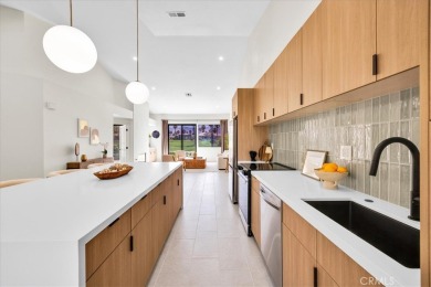 As you walk into this fully remodeled 2-bedroom, 2.5-bath home on  in California - for sale on GolfHomes.com, golf home, golf lot