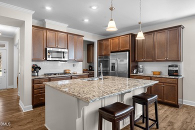 Nestled within the quiet, well-kept gated community of Legacy at on The Preserve At Jordan Lake Golf Club in North Carolina - for sale on GolfHomes.com, golf home, golf lot