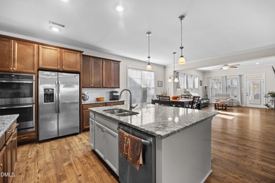 Nestled within the quiet, well-kept gated community of Legacy at on The Preserve At Jordan Lake Golf Club in North Carolina - for sale on GolfHomes.com, golf home, golf lot