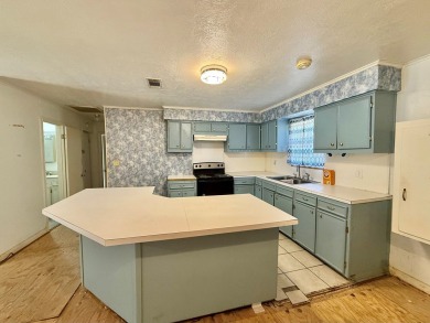 Discover the potential of this cozy 2-bed, 2-bath home in the on Pendleton Harbor in Texas - for sale on GolfHomes.com, golf home, golf lot