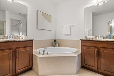 Stunning 4-bedroom, 4-bath home in the exclusive Eagle Creek on Eagle Creek Golf Club in Florida - for sale on GolfHomes.com, golf home, golf lot