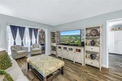 Experience refined Florida living in this exceptional, move-in on Feather Sound Country Club in Florida - for sale on GolfHomes.com, golf home, golf lot