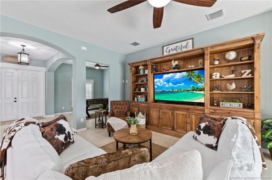 Every day is a vacation in this custom CBS 4 bedroom, 4.5 bath on The Cape Club of Palm City in Florida - for sale on GolfHomes.com, golf home, golf lot
