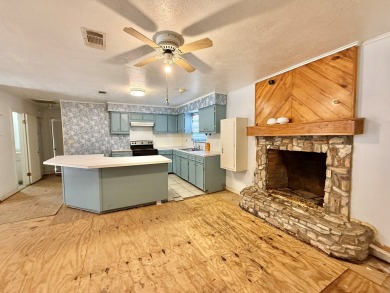 Discover the potential of this cozy 2-bed, 2-bath home in the on Pendleton Harbor in Texas - for sale on GolfHomes.com, golf home, golf lot