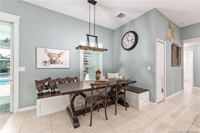 Every day is a vacation in this custom CBS 4 bedroom, 4.5 bath on The Cape Club of Palm City in Florida - for sale on GolfHomes.com, golf home, golf lot